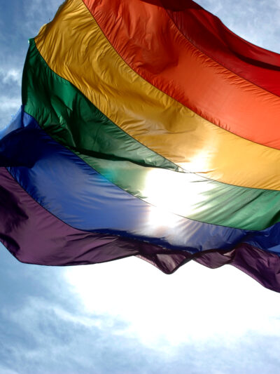 Rainbow_flag_and_blue_skies_0.jpg