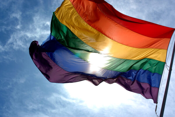 Rainbow_flag_and_blue_skies_0.jpg