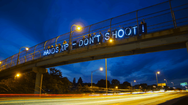 web18_handsupdontshoot