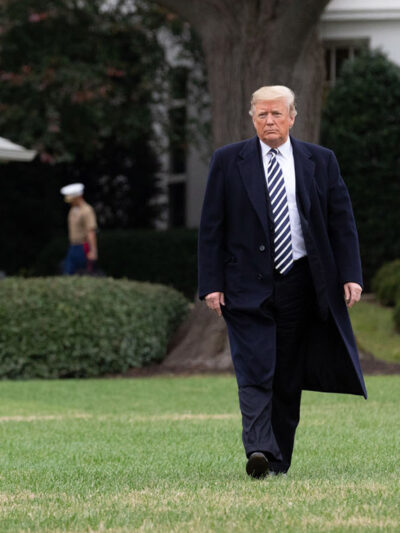 Trump walking on the White House Lawn