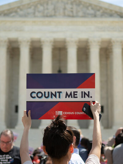Demonstrators marching against adding a question regarding citizenship to the Census