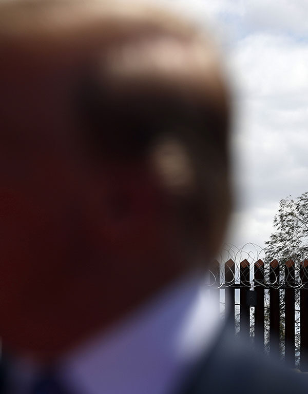 President Donald Trump speaks as he visits a new section of the border wall with Mexico in Calexico, Calif.
