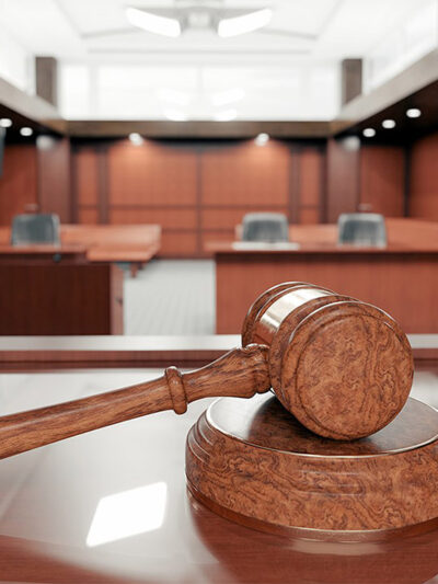 Image of a gavel in a courtroom