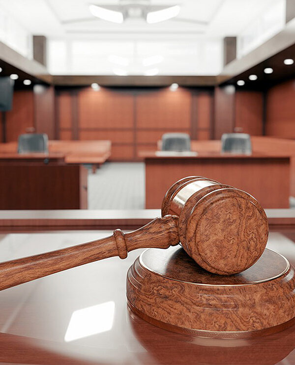 Image of a gavel in a courtroom