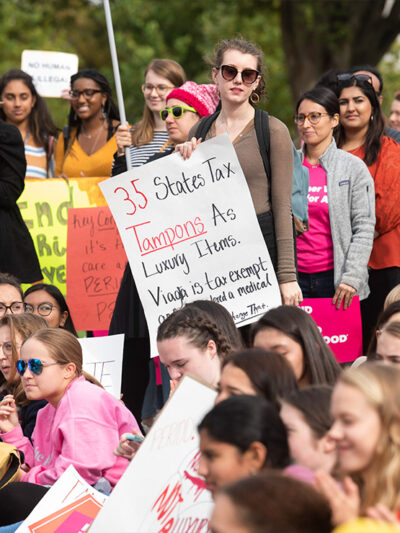 Menstrual activists demonstrate at the Capitol during a National Period Day rally.