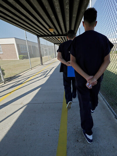 WEB19-Detained-Immigrants-Walking-BlogImage-WordPress-1110x740.jpg