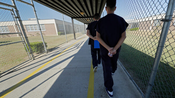WEB19-Detained-Immigrants-Walking-BlogImage-WordPress-1110x740.jpg