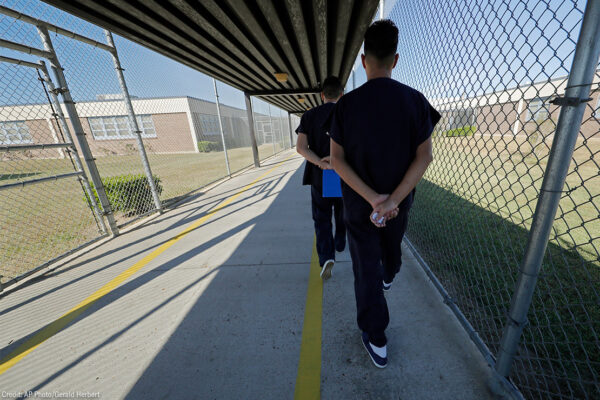 WEB19-Detained-Immigrants-Walking-BlogImage-WordPress-1110x740.jpg