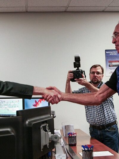 Sarasota Supervisor of Elections Ron Turner with Vietnam War veteran and Purple Heart recipient Alan Rhyelle