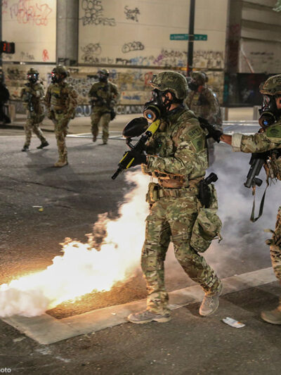 Militarized federal agents deployed by the president to Portland, fire tear gas against protesters