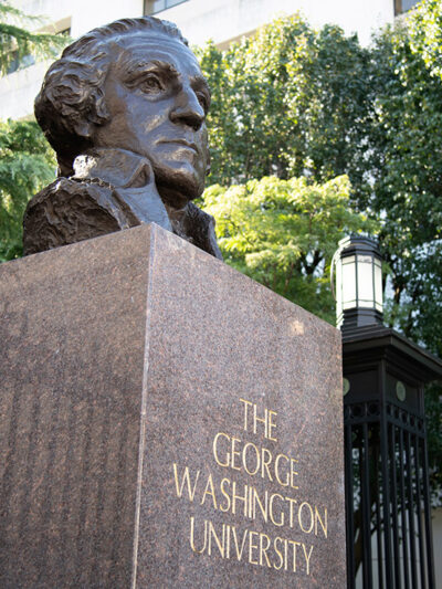 A bust of George Washington at a gate at The George Washington University (GWU) campus in Washington, D.C.