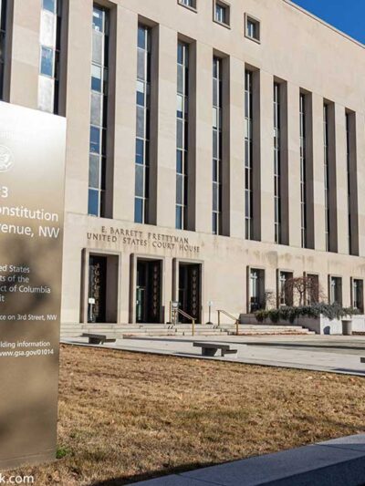 E. Barrett Prettyman United States Courthouse information sign at the entrance to the Federal courthouse in Washington, D.C.