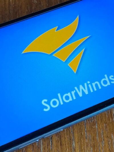 The logo of SolarWinds is seen on a phone screen