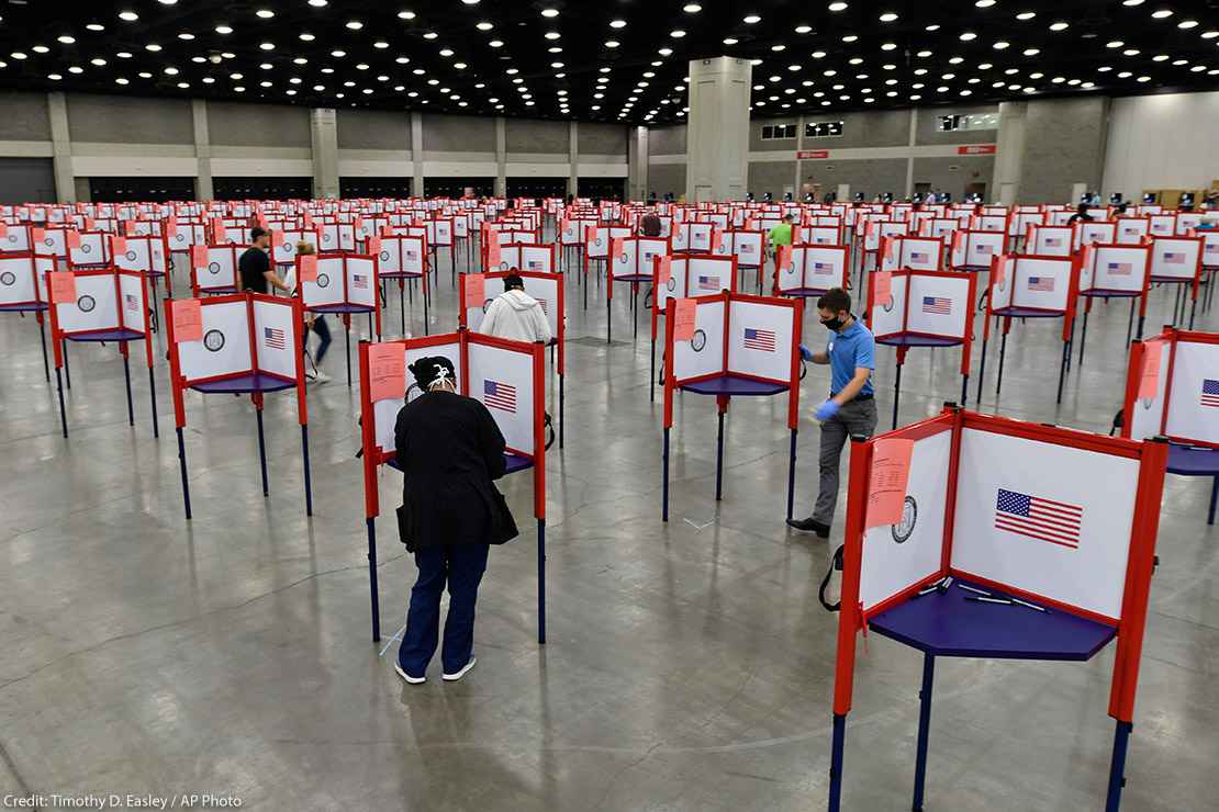 Photo of multiple voting stations set up in the Kentucky Exposition Center for voters to cast their ballot.