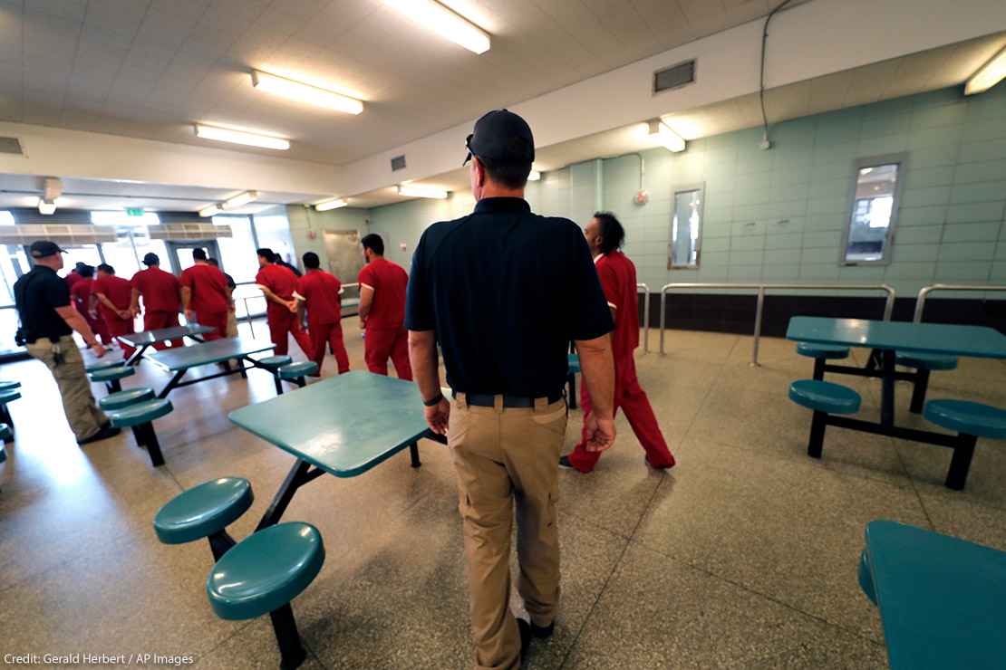 Immigration detainees leave the cafeteria under the watch of guards during a media tour at the Winn Correctional Center in Winnfield, La., in this Thursday, Sept. 26, 2019 file photo.