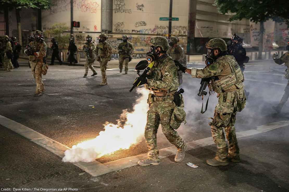 Militarized federal agents deployed by the president to Portland, fire tear gas against protesters