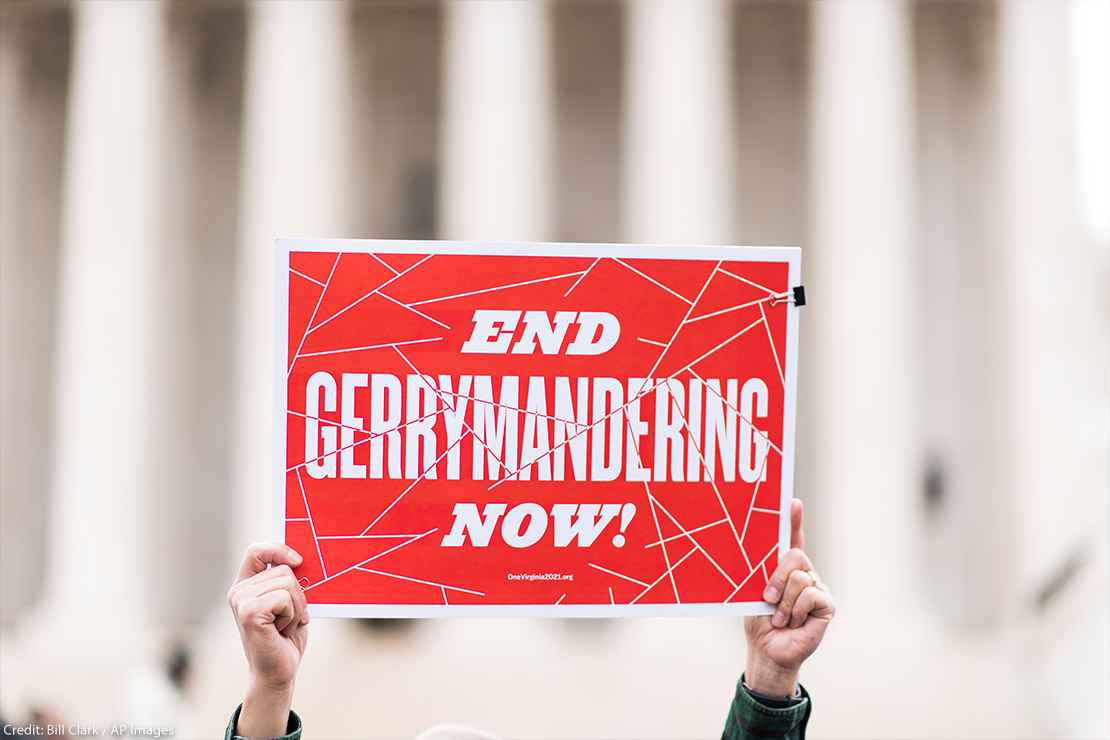 Gerrymandering activists gather on the steps of the Supreme Court as the court prepares to hear the the Benisek v. Lamone case on Wednesday, March 28, 2018.