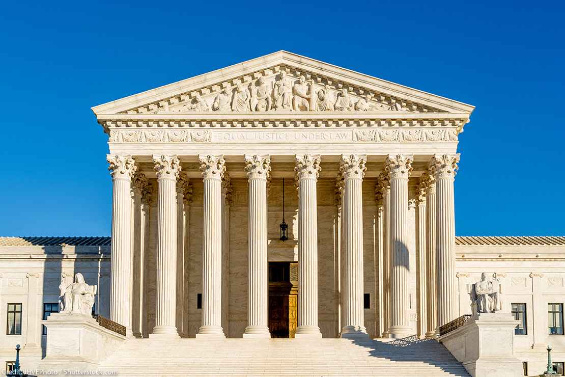 Photo of the front of the Supreme Court building on a sunny day