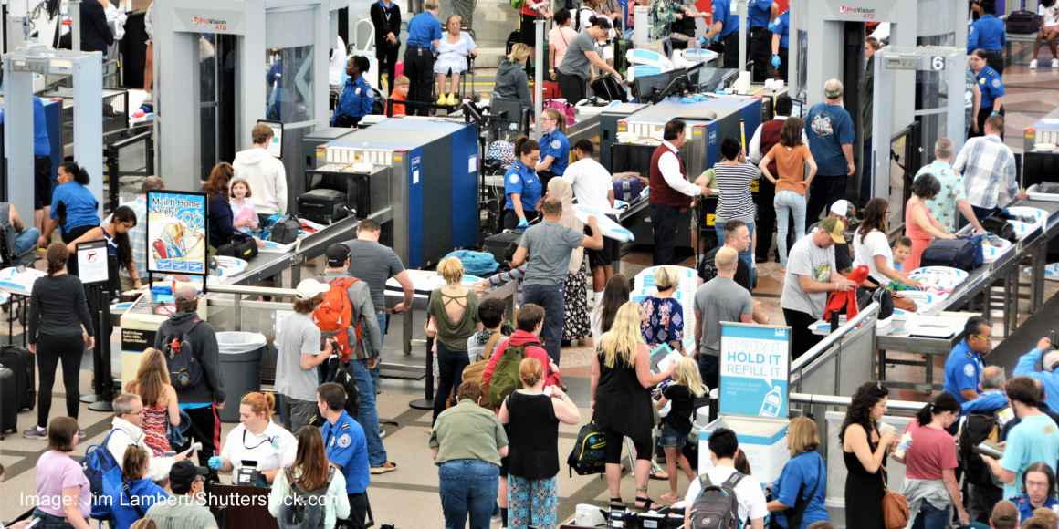 Travelers waiting in long lines to pass through the Transportation Security Administrations (TSA) security screening areas to get to their flights.