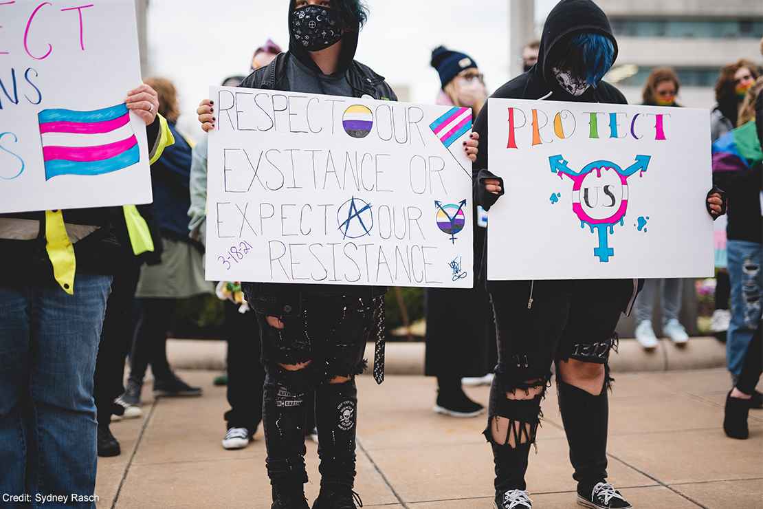 Demonstrators protesting anti-trans bills.